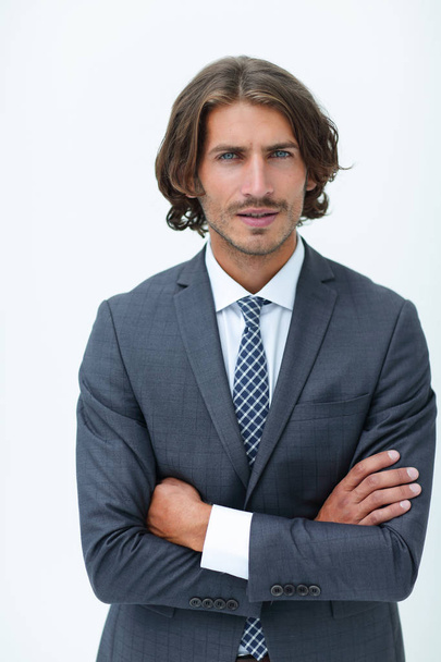 Happy young man with dark hair wearing an elegant suit - Photo, image