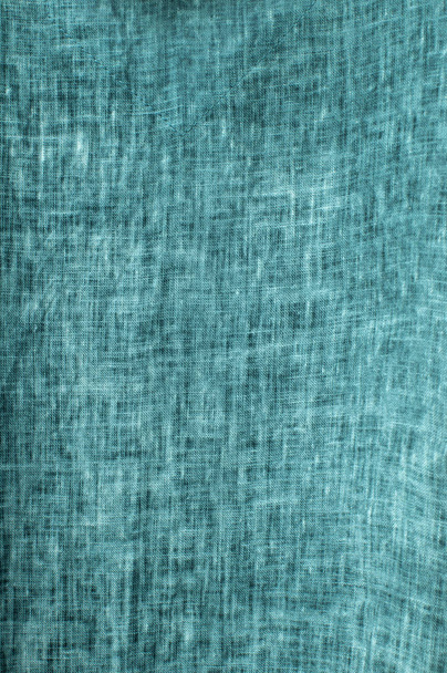 Texture of turquoise natural linen flax fabric closeup as textile background - Photo, Image