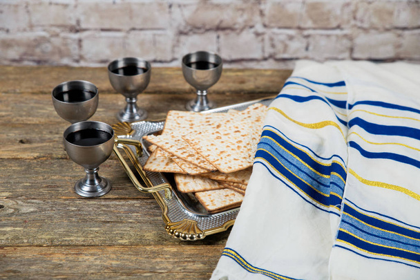 Four glasses of wine should be drunk on Passover according to Jewish kiddush cup of wine tradition - Photo, Image