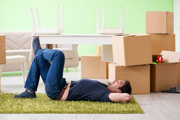 Man moving house with boxes - Photo, Image