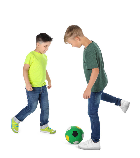 Little children playing soccer on white background. Indoor entertainment - Foto, immagini