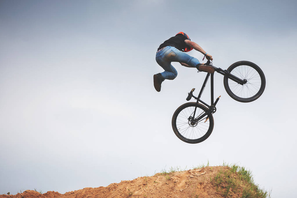 mtb dirt rider doing trick on a jump - Photo, Image
