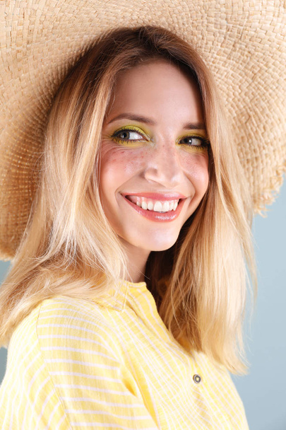 Beautiful young woman in hat, closeup. Summer fashion - Fotoğraf, Görsel
