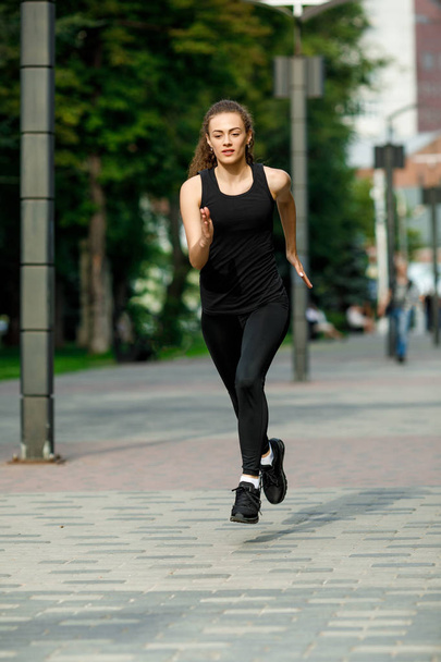 young attractive woman running - Фото, изображение