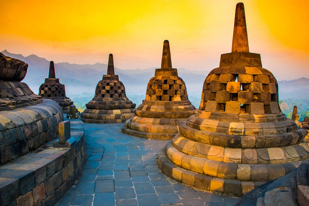 Sunrise Landscape of Buddhist temple complex Borobudur, Yogyakarta, Jawa, Indonesia - Photo, Image
