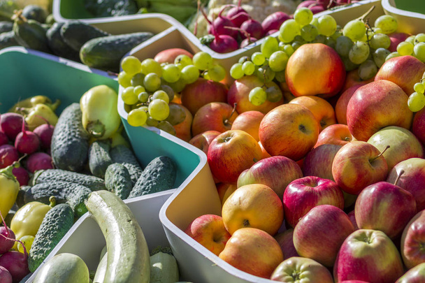 Farmers fruit market with various colorful fresh fruits and vegetables - Fotó, kép