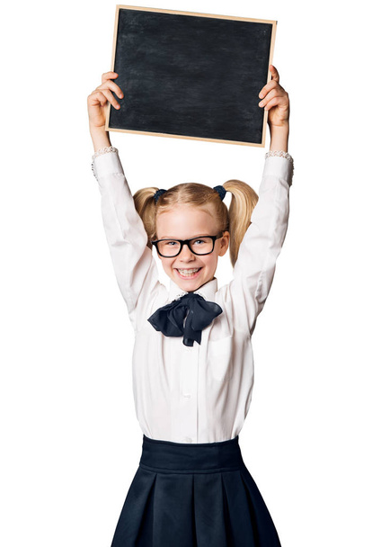 Child Girl Advertising School Blackboard, Kid in Glasses Raised Up Advertisement on Blank Chalkboard, Isolated over White Background - Fotoğraf, Görsel
