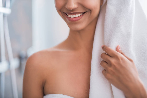 Glad girl wrapping in towel - Photo, Image