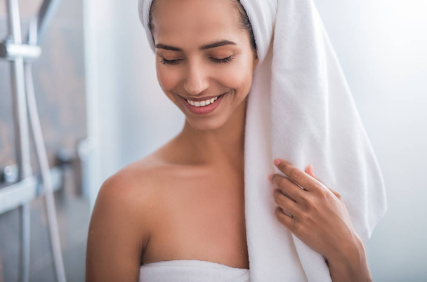 Smiling female after taking shower - Фото, изображение