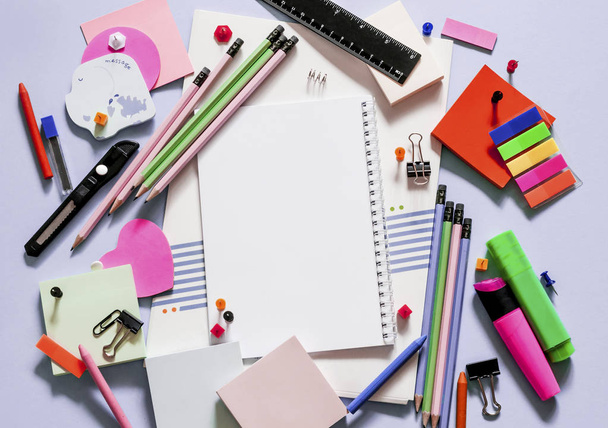 beautiful office supplies for school and office on a purple background - 写真・画像