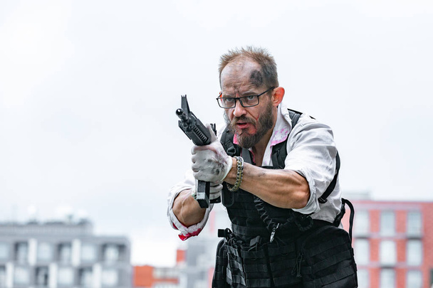 man took aim with the pistol. Action Movie Style - 写真・画像