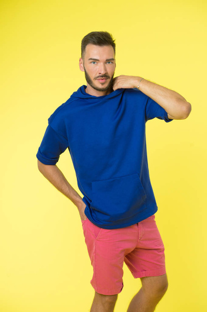 Active concept. Active lifestyle. Man in active wear on yellow background. Be active in style - Foto, Imagem