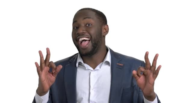 Black businessman with different facial expressions and gestures. - Imágenes, Vídeo