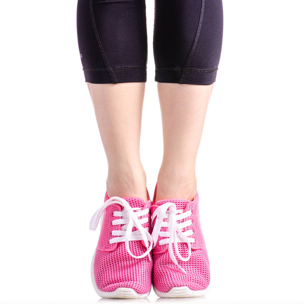 Kobiece nogi sportowe legginsy ćwiczenia sportowe trampki - Zdjęcie, obraz