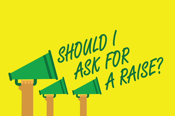 Handwriting text writing Should I Ask For A Raise question. Concept meaning demanding increase in your month salary Hands holding megaphones loudspeakers important message yellow background - Photo, Image