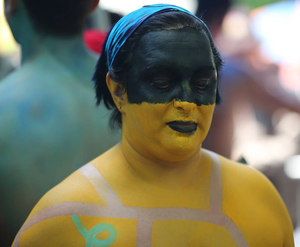 NEW YORK - JULY 14, 2018: Artists paint  fully nude models of all shapes and sizes during 5th NYC Body Painting Day featuring artist Andy Golub on Washington Square in New York - 写真・画像