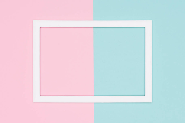 Abstract geometrical pastel blue and pink colored paper flat lay background. Minimalism template with empty picture frame mock up. - Fotoğraf, Görsel