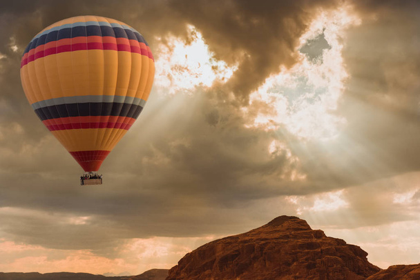 Hot Air Balloon travel over desert - 写真・画像