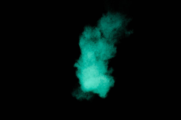 Aquamarine powder explosion on black background. Colored powder cloud. Colorful dust explode. Paint  Holi. - Photo, Image