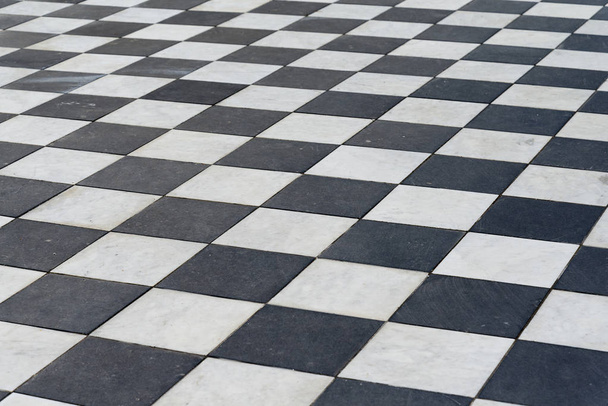 Black and white tiles. Chess floor as background. - Photo, Image