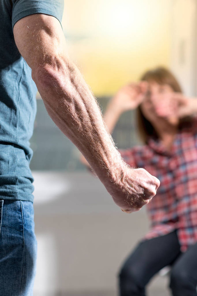 Man about to beat up his wife at home - Photo, Image