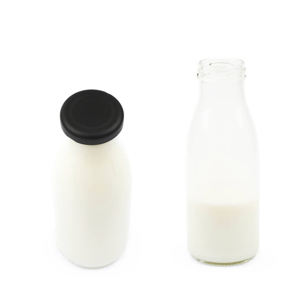 Glass bottle of milk isolated - Fotoğraf, Görsel