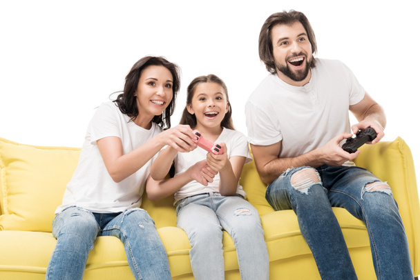 portrait of happy family playing video games together isolated on white - Photo, Image