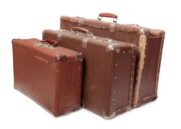 Ancient suitcase for travel on a white background - Φωτογραφία, εικόνα