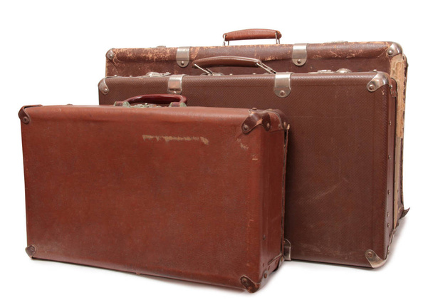 Ancient suitcase for travel on a white background - Valokuva, kuva