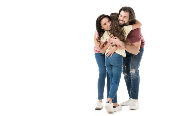 happy family hugging with daughter isolated on white - Foto, immagini