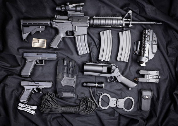 modern weapon, black background - Photo, image