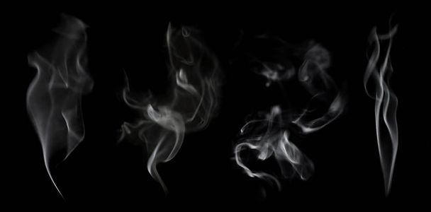 Conjunto de humo blanco desenfocado abstracto aislado sobre fondo negro
 - Foto, Imagen