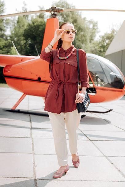 Beautiful pretty woman trying helicopter flight - Foto, Imagem