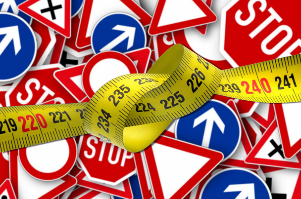 tape measure tangled close up  with traffic road signs - Photo, Image