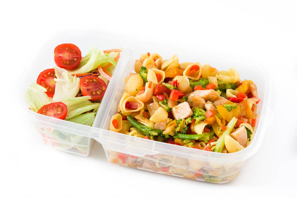 Healthy meal prep container with pasta salad with turkey and vegetables isolated on white background - Photo, Image