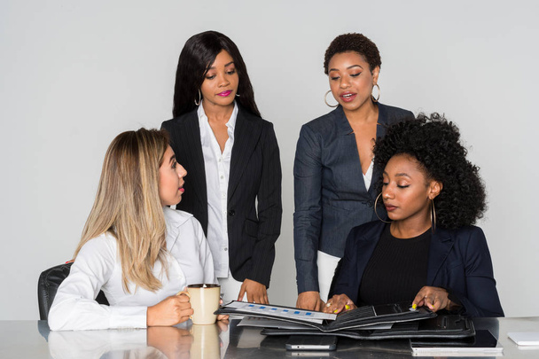 Group of four hispanic and african american businesswomen - Photo, image