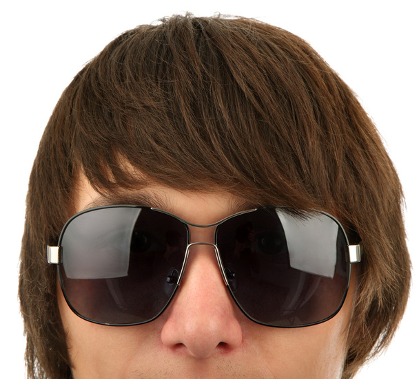 Голова молодого человека в солнечных очках
 - Фото, изображение