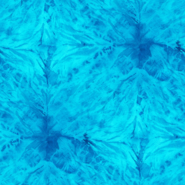 Seamless tie-dye pattern of turquoise color on white silk. Hand painting fabrics - nodular batik. Shibori dyeing.  - Photo, Image