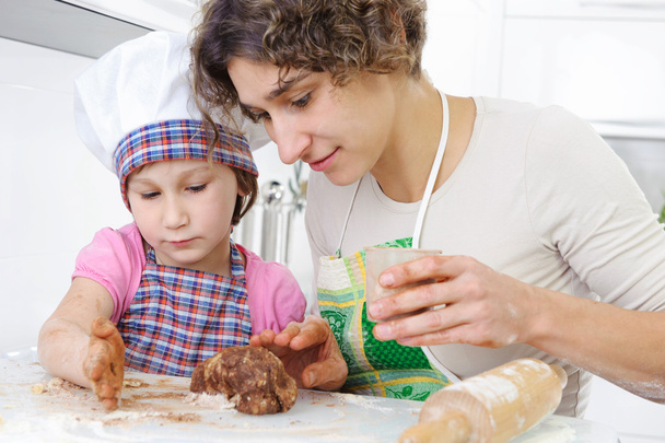 Mother with daughter making cookies - Zdjęcie, obraz