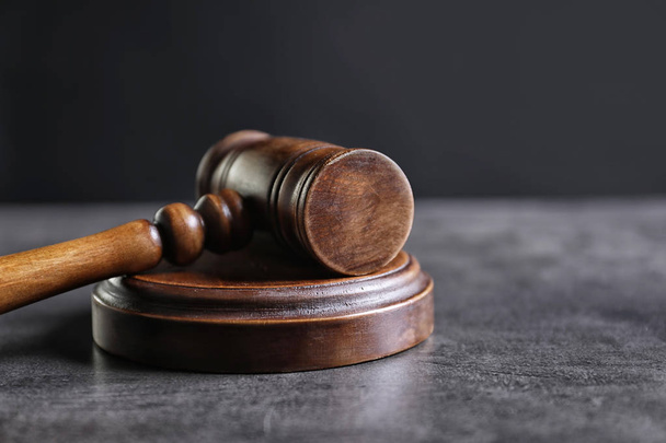 Judge's gavel on grey table. Law concept - Fotó, kép