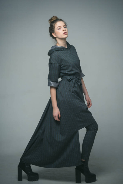 fashion. fashion model pose in studio. fashion and beauty concept. fashion girl in long coat. - Photo, Image