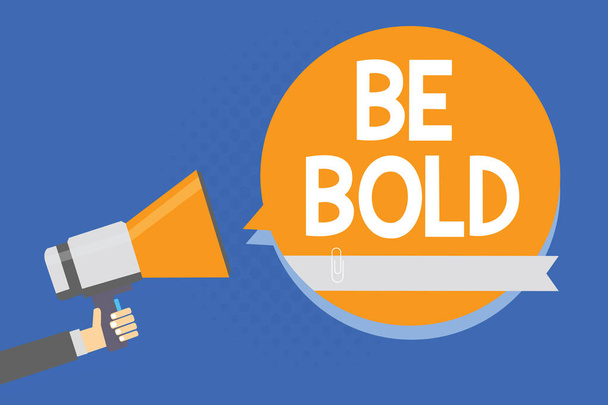 Text sign showing Be Bold. Conceptual photo Go for it Fix it yourself instead of just talking Tough Hard Man holding megaphone loudspeaker orange speech bubble blue background - Photo, Image