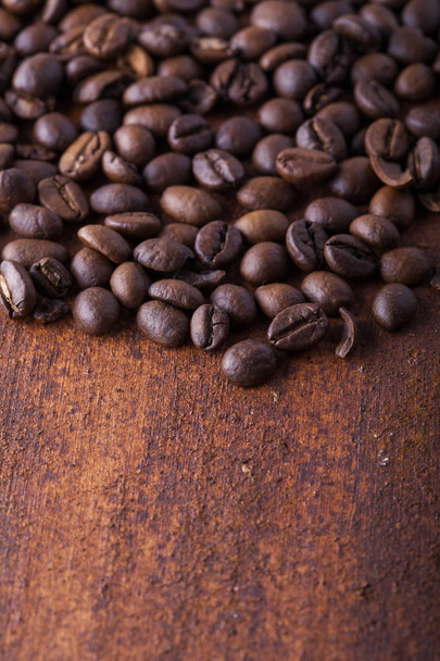 Photo closeup of coffee beans. Rusty background. Copy space. - Fotoğraf, Görsel