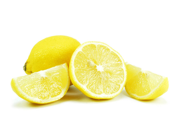 Ripe lemon fruits on the white background. - Foto, Bild