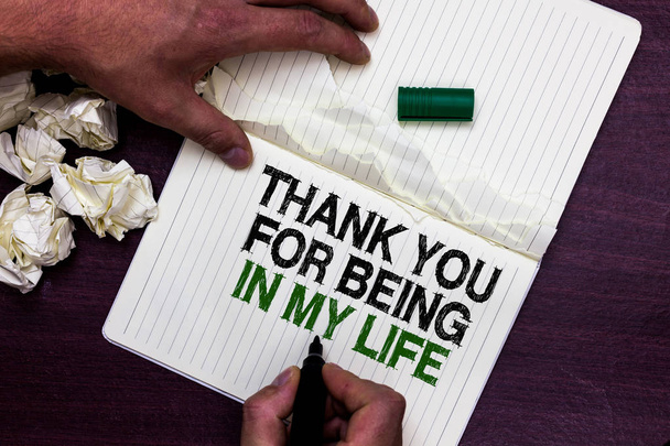 Text sign showing Thank You For Being In My Life. Conceptual photo loving someone for being by your side Man holding marker notebook page crumpled papers several tries mistakes - Photo, Image