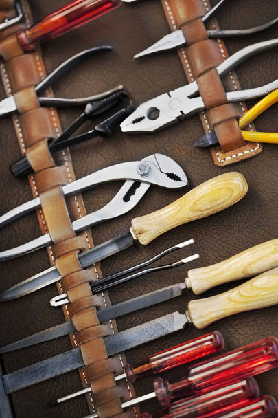 Close up of a tools leather kit - Zdjęcie, obraz