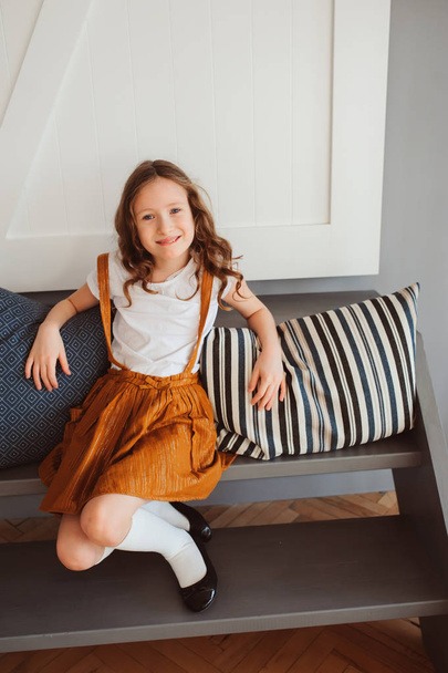 happy kid girl relaxing in new house. Buying new home, moving to big apartments, house rental concept. - Fotoğraf, Görsel