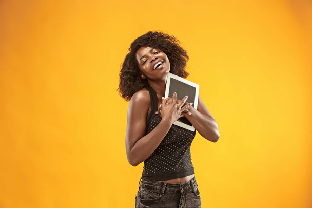 The happy businesswoman with laptop - Фото, изображение