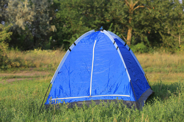tourist tent on green meadow - Photo, Image