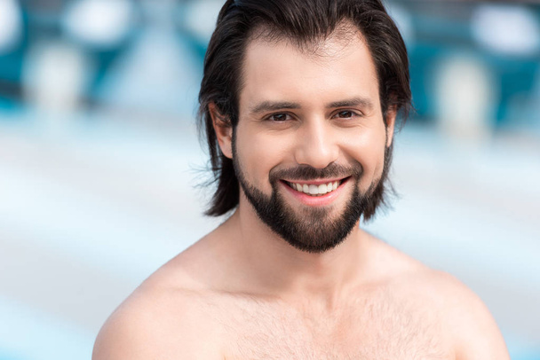portrait of handsome bearded shirtless man smiling at camera - Photo, Image